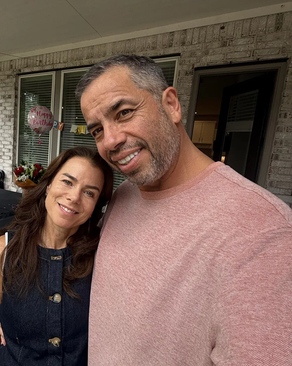 Alejandro and Adriana, the owners of 1-800 Buy Homes